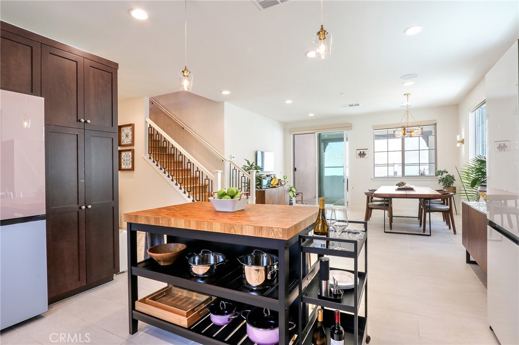 981 Rodeo Road Pomona, CA 91766 - Photo 10 of 47 a view of a dining room with furniture and window