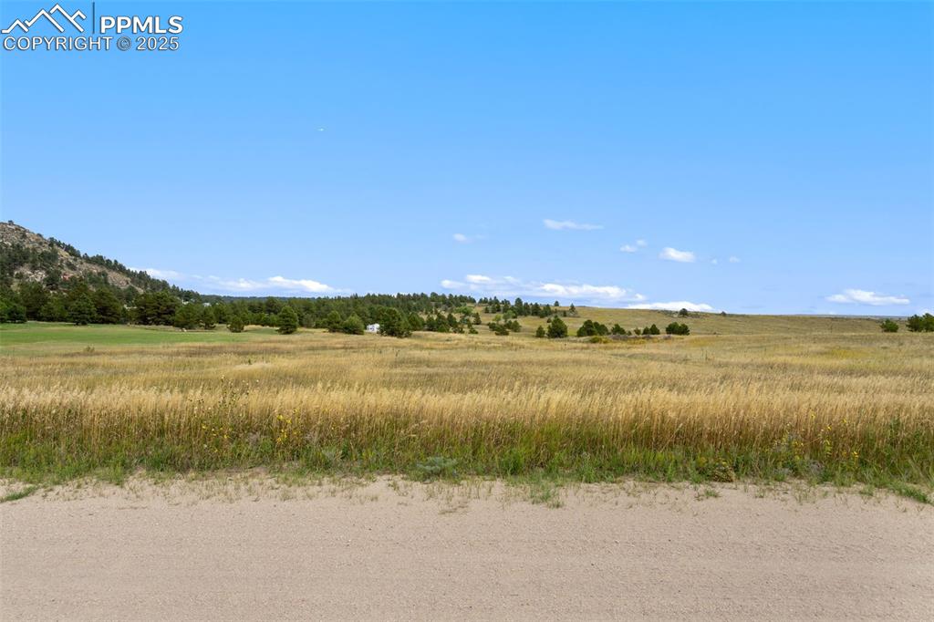 15550 Atlas Loop Peyton, CO 80831 - Photo 11 of 23 a view of a lake with a city