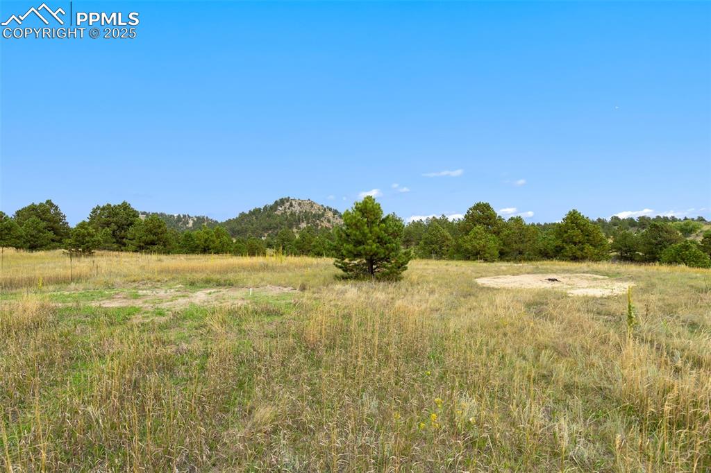 15550 Atlas Loop Peyton, CO 80831 - Photo 16 of 23 a view of lake and mountain