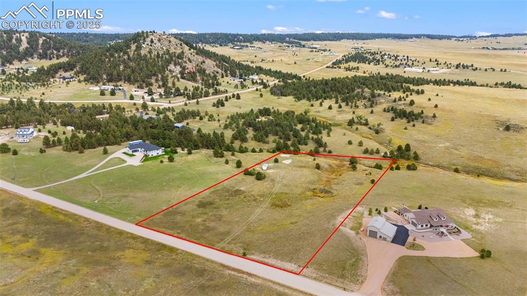 15550 Atlas Loop Peyton, CO 80831 - Photo 2 of 23 a view of a city