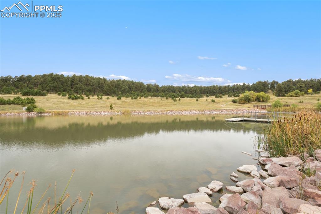 15550 Atlas Loop Peyton, CO 80831 - Photo 23 of 23 a view of lake with green space