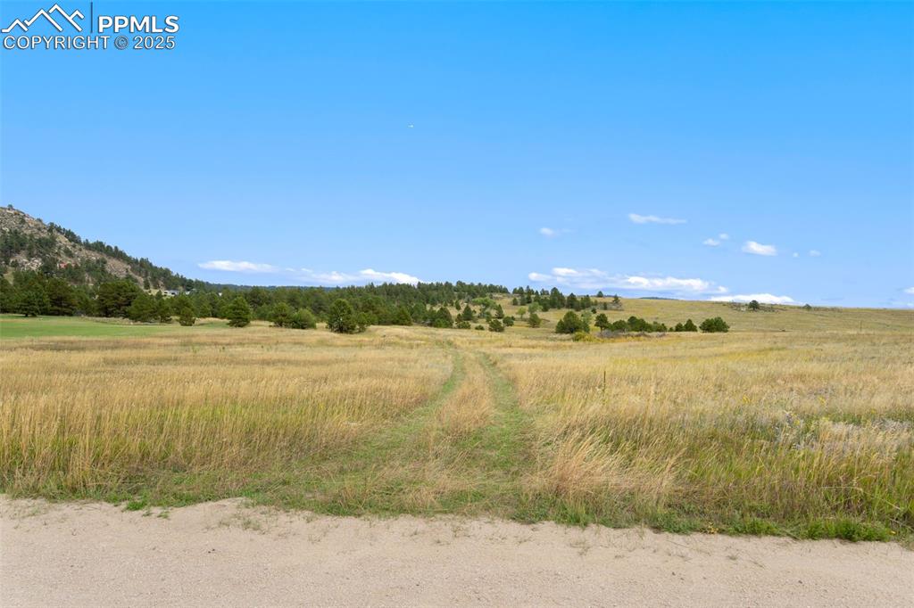 15550 Atlas Loop Peyton, CO 80831 - Photo 5 of 23 a view of an ocean and beach