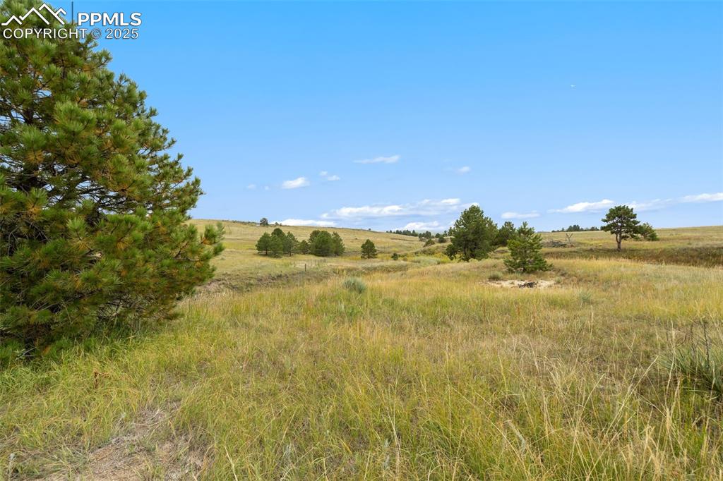 15550 Atlas Loop Peyton, CO 80831 - Photo 8 of 23 a view of ocean view with beach