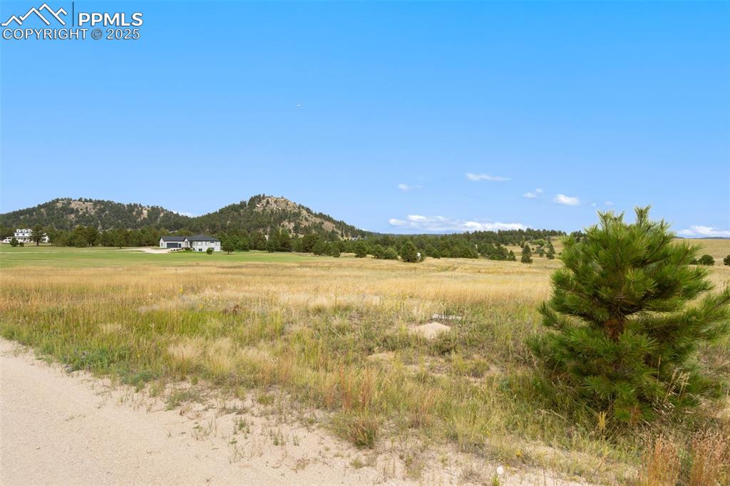 15550 Atlas Loop Peyton, CO 80831 - Photo 10 of 23 a view of an ocean and beach