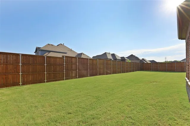a view of a house with a large window