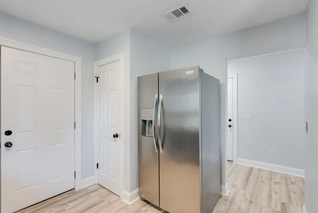 a bathroom with a double vanity sink