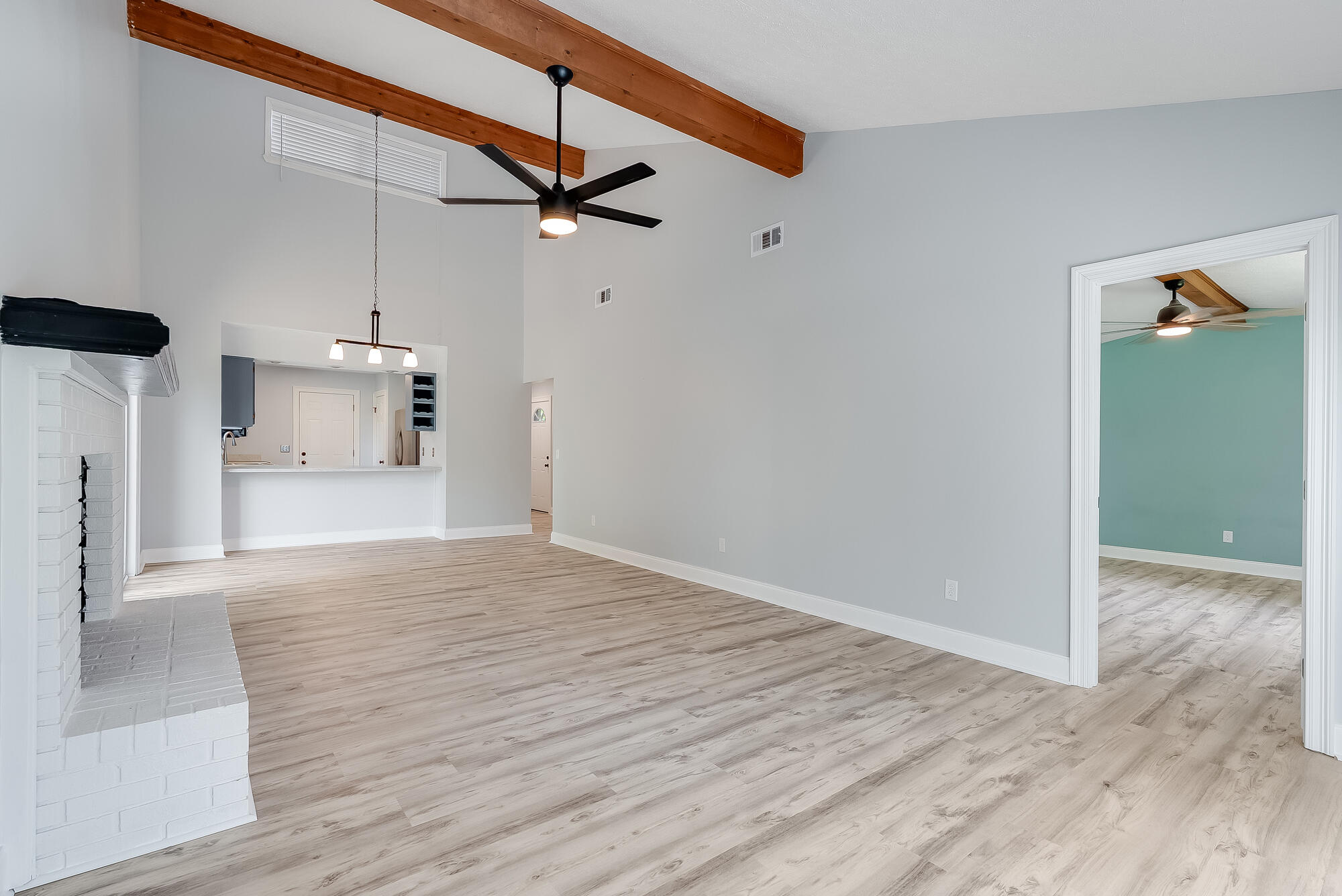 1307 Calabria Road, Unit 4A Panama City, FL 32405 - Photo 19 of 35 a view of empty room with wooden floor