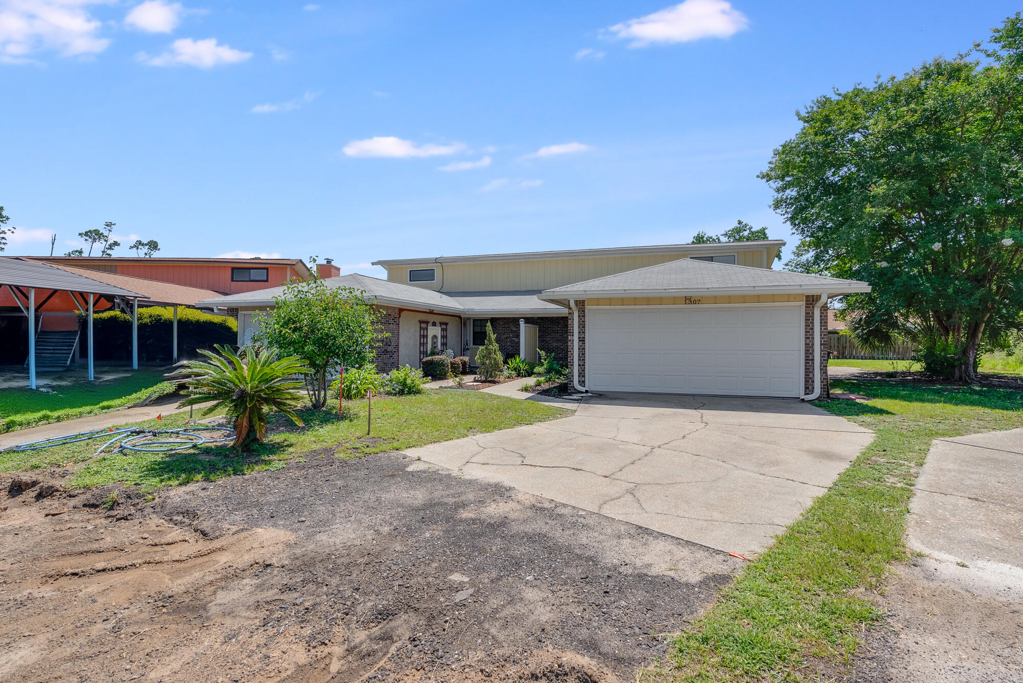 1307 Calabria Road, Unit 4A Panama City, FL 32405 - Photo 4 of 35 a front view of house with yard and green space