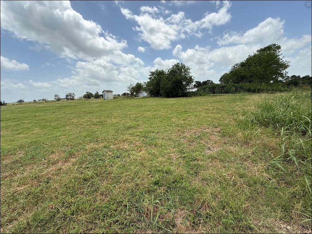 18543 Cyclone Branch Road Burlington, TX 76519 - Photo 7 of 13 a view of a field with an ocean