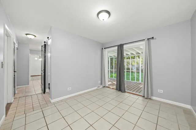 a view of an empty room and window