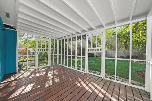 a view of backyard with green space