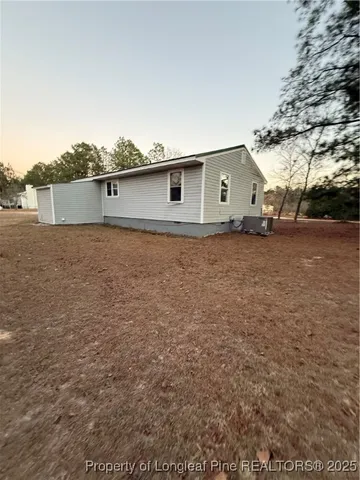 a house view with a outdoor space