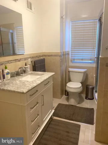 a bathroom with a sink and a toilet