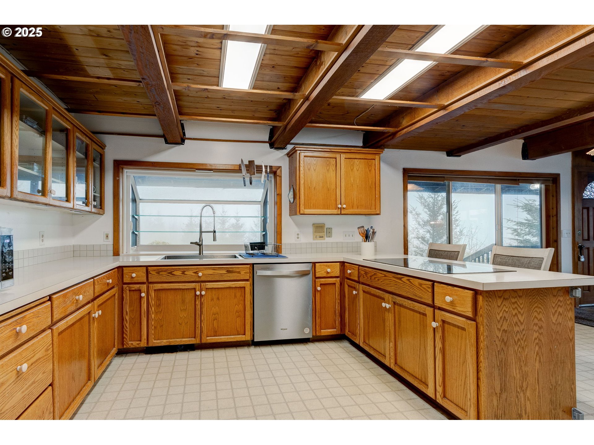 43907 Northeast Columbia Tie Road Amboy, WA 98601 - Photo 11 of 42 a kitchen with stainless steel appliances granite countertop a sink window and cabinets