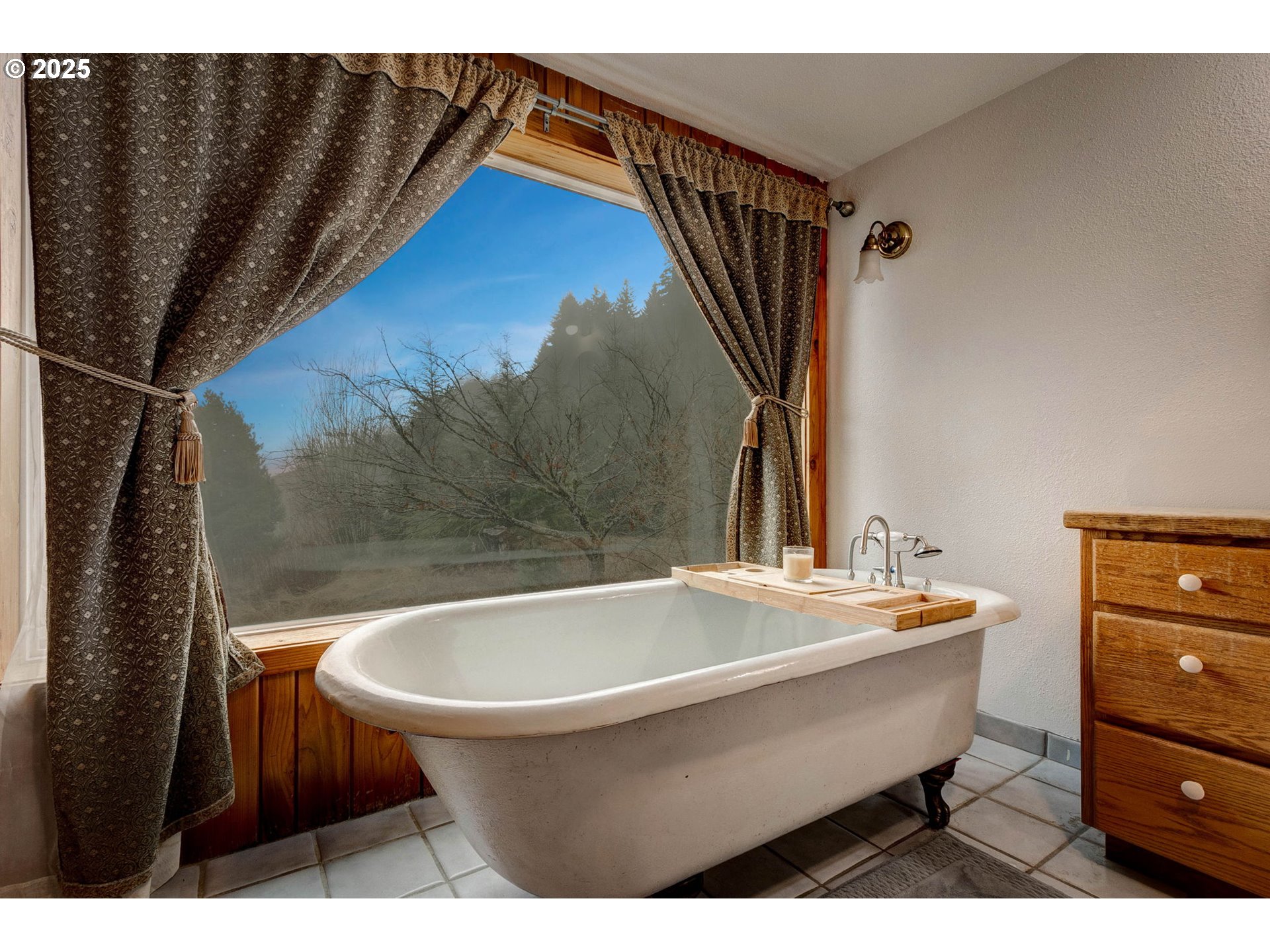 43907 Northeast Columbia Tie Road Amboy, WA 98601 - Photo 18 of 42 a bathroom with a sink a mirror and a bathtub