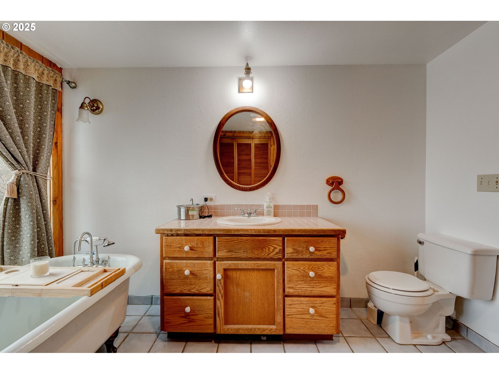 43907 Northeast Columbia Tie Road Amboy, WA 98601 - Photo 19 of 42 a bathroom with a sink mirror vanity and toilet