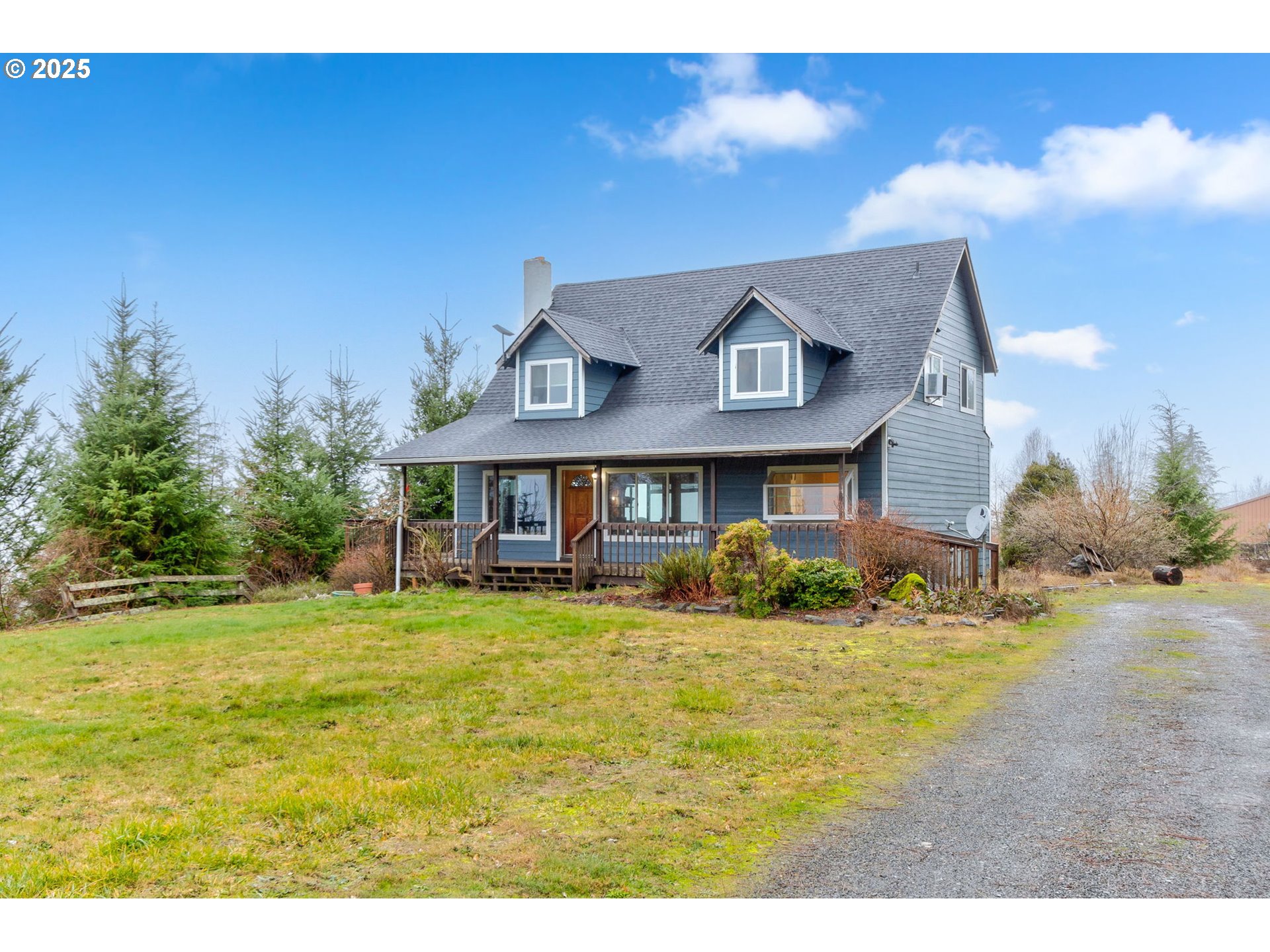 43907 Northeast Columbia Tie Road Amboy, WA 98601 - Photo 2 of 42 a front view of a house with garden