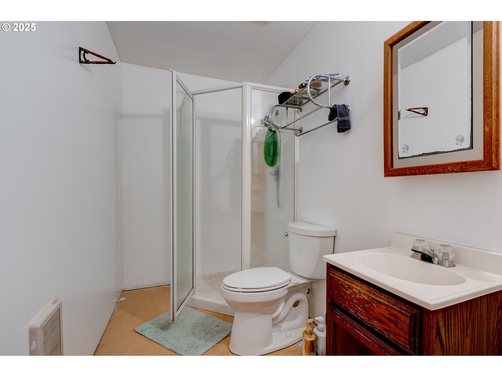 43907 Northeast Columbia Tie Road Amboy, WA 98601 - Photo 21 of 42 a bathroom with a sink vanity mirror and toilet