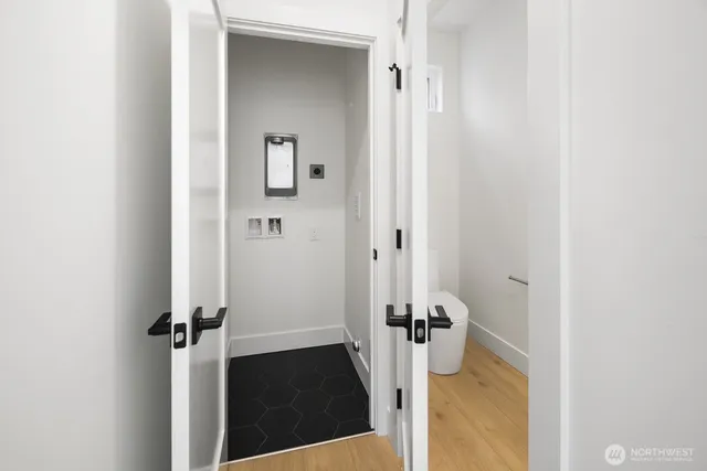 a bathroom with a tub and a sink