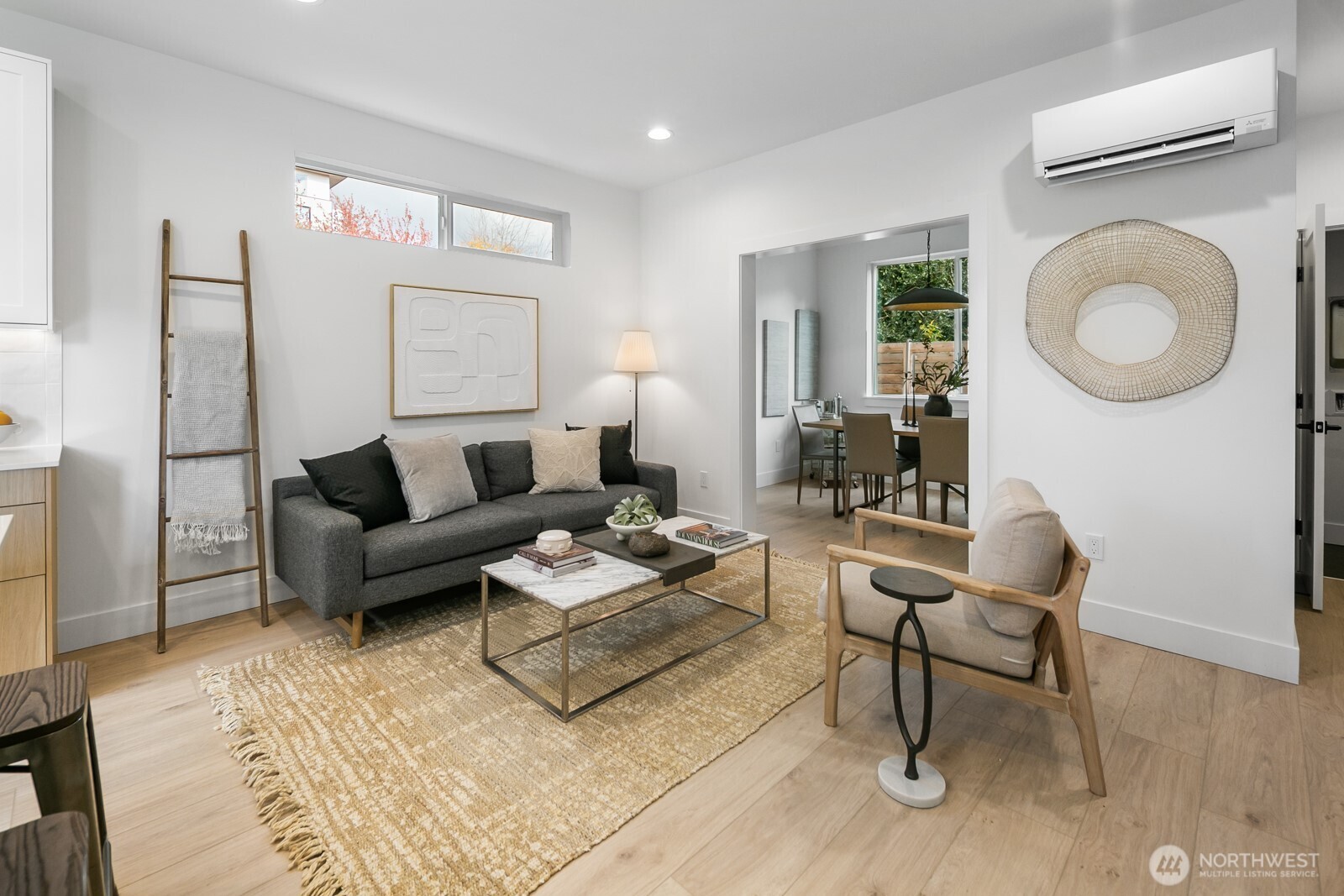 320 North 84th Street Seattle, WA 98103 - Photo 2 of 30 a living room with furniture and a wooden floor