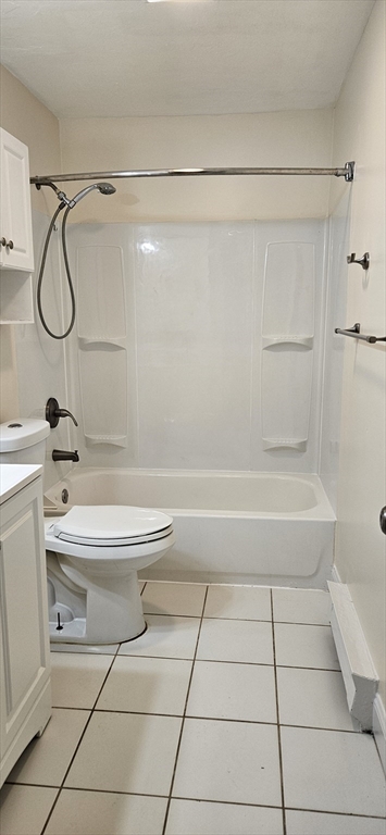 71 Edgeworth Street, Unit 5 Worcester, MA 01605 - Photo 3 of 3 a bathroom with a toilet and a shower