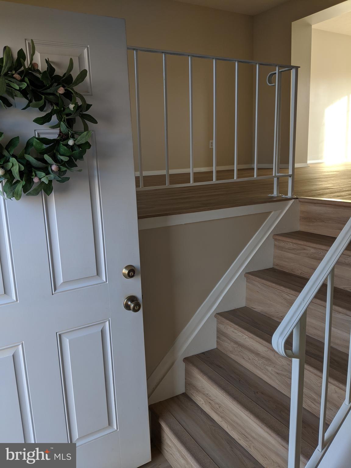437 Kosoak Road Middle River, MD 21220 - Photo 4 of 21 Foyer leads to living room and lower level