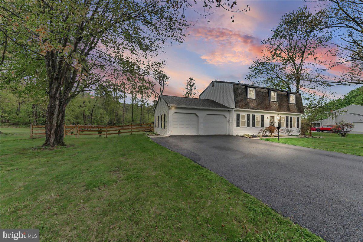 772 Hunters Run Road Pottstown, PA 19465 - Photo 1 of 44 a front view of a house with a yard