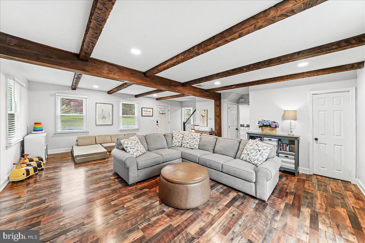 772 Hunters Run Road Pottstown, PA 19465 - Photo 12 of 44 a living room with furniture and a wooden floor