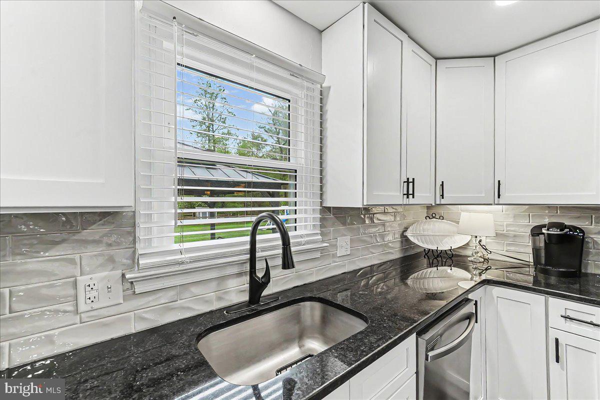 772 Hunters Run Road Pottstown, PA 19465 - Photo 20 of 44 a kitchen with a sink and cabinets