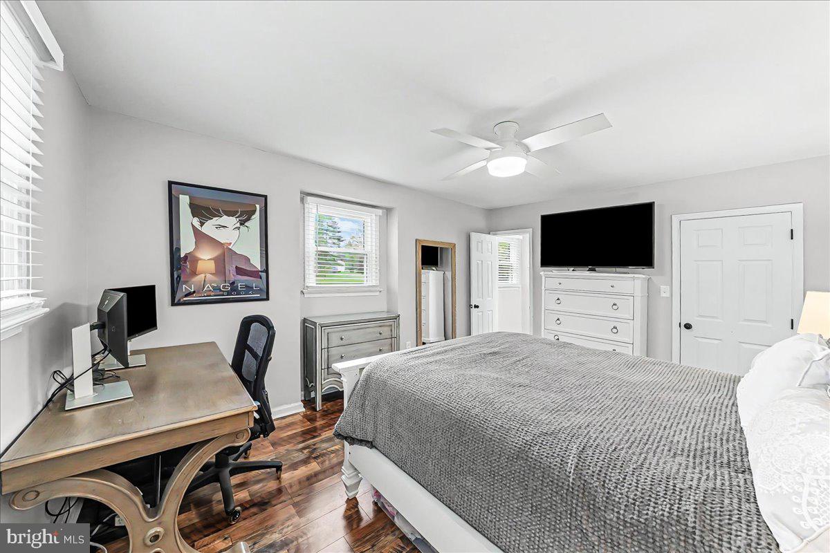 772 Hunters Run Road Pottstown, PA 19465 - Photo 26 of 44 a bedroom with a bed and a flat screen tv