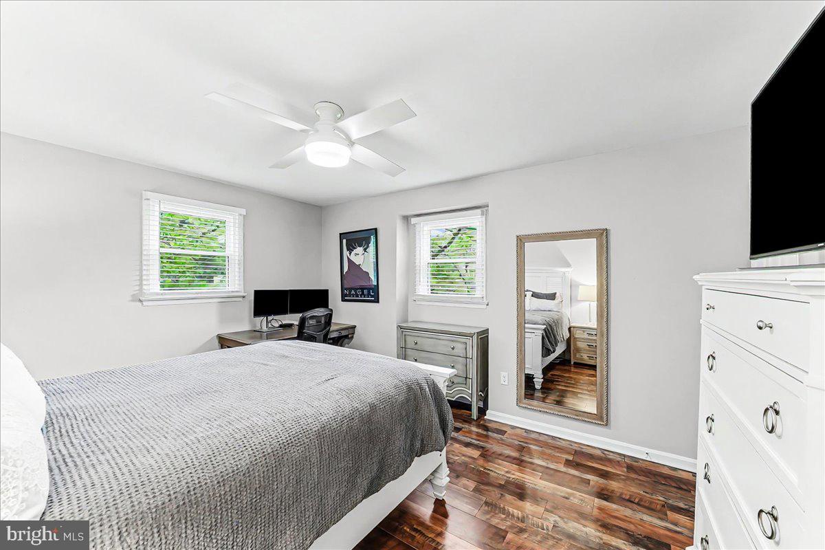 772 Hunters Run Road Pottstown, PA 19465 - Photo 27 of 44 a bedroom with a bed and a flat screen tv