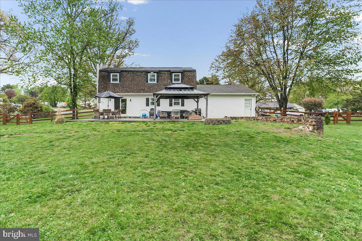 772 Hunters Run Road Pottstown, PA 19465 - Photo 3 of 44 a house view with a sitting space and garden