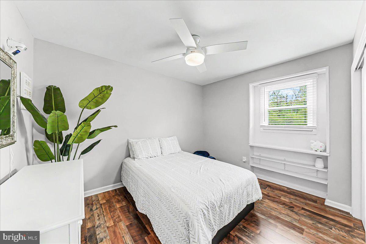 772 Hunters Run Road Pottstown, PA 19465 - Photo 32 of 44 a bedroom with bed and a potted plant