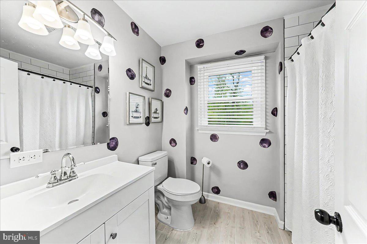 772 Hunters Run Road Pottstown, PA 19465 - Photo 33 of 44 a bathroom with a sink a toilet and a mirror