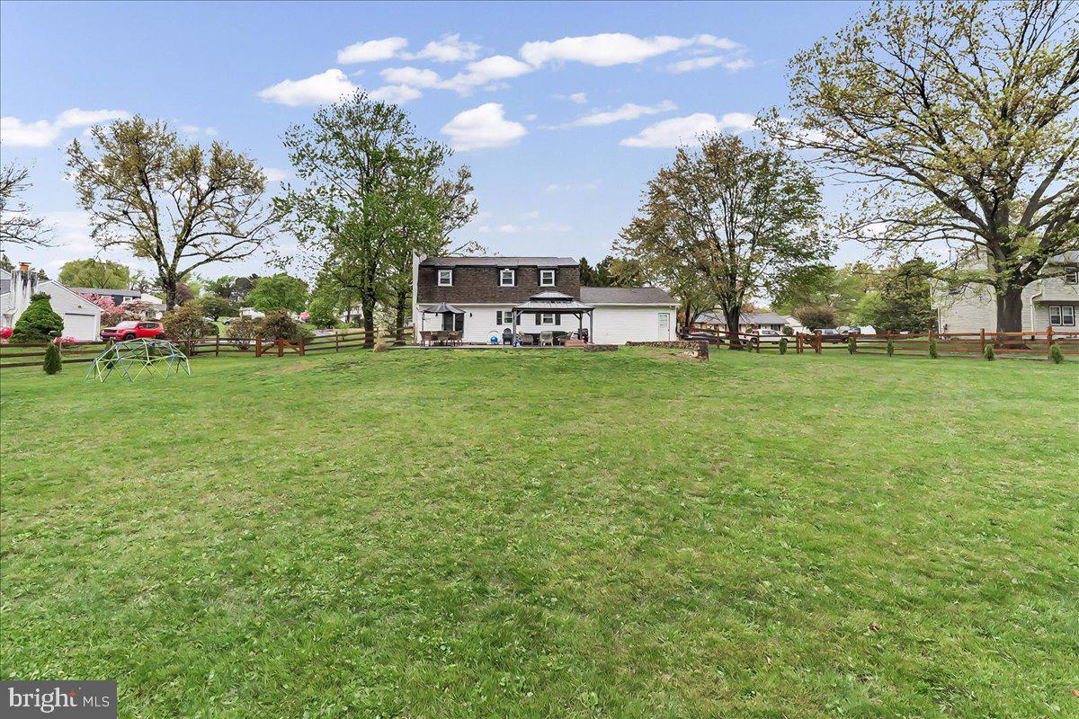 772 Hunters Run Road Pottstown, PA 19465 - Photo 41 of 44 a view of a house with a big yard and large trees