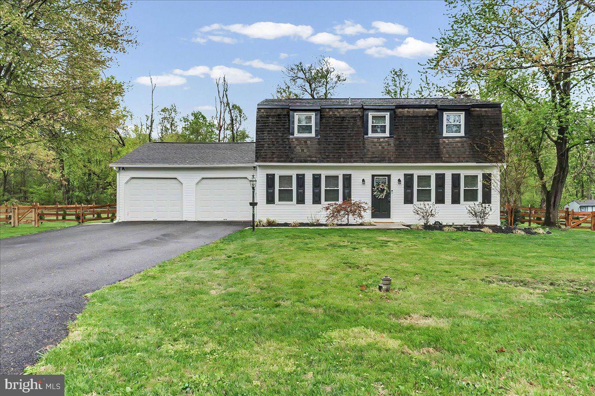772 Hunters Run Road Pottstown, PA 19465 - Photo 42 of 44 front view of a house with a garden