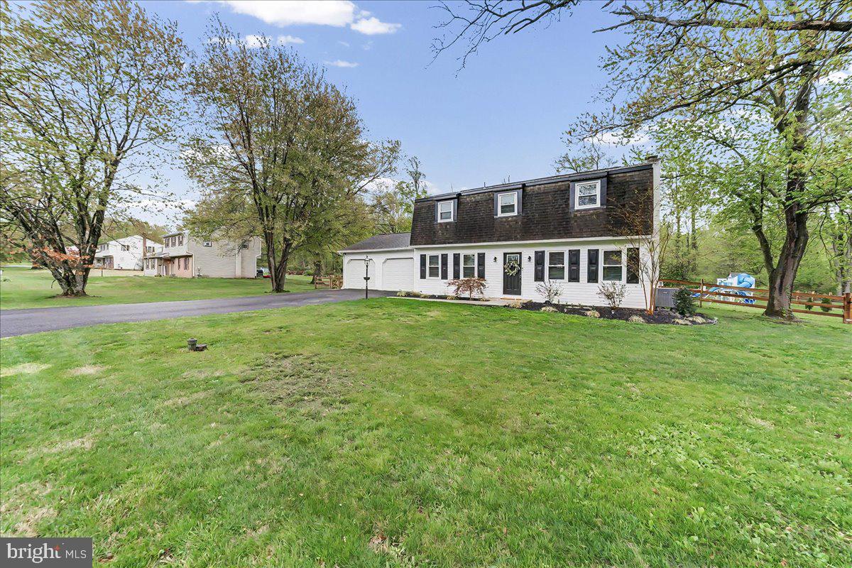 772 Hunters Run Road Pottstown, PA 19465 - Photo 6 of 44 a view of a house with a back yard