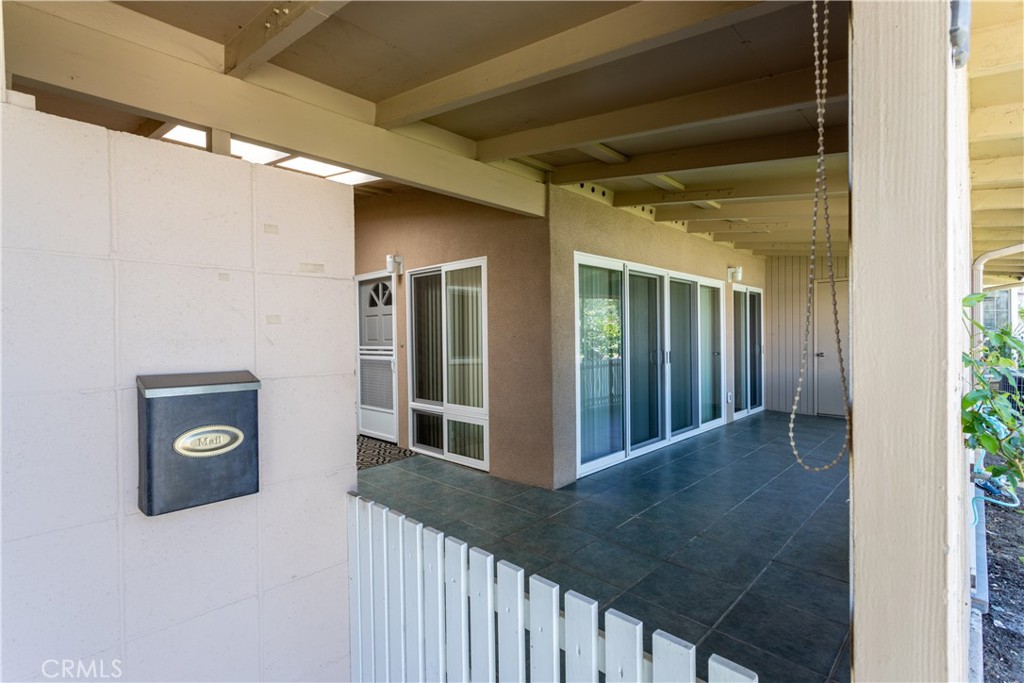 1180 Oakmont Road, Unit 51H Seal Beach, CA 90740 - Photo 8 of 31 a view of a house with a porch