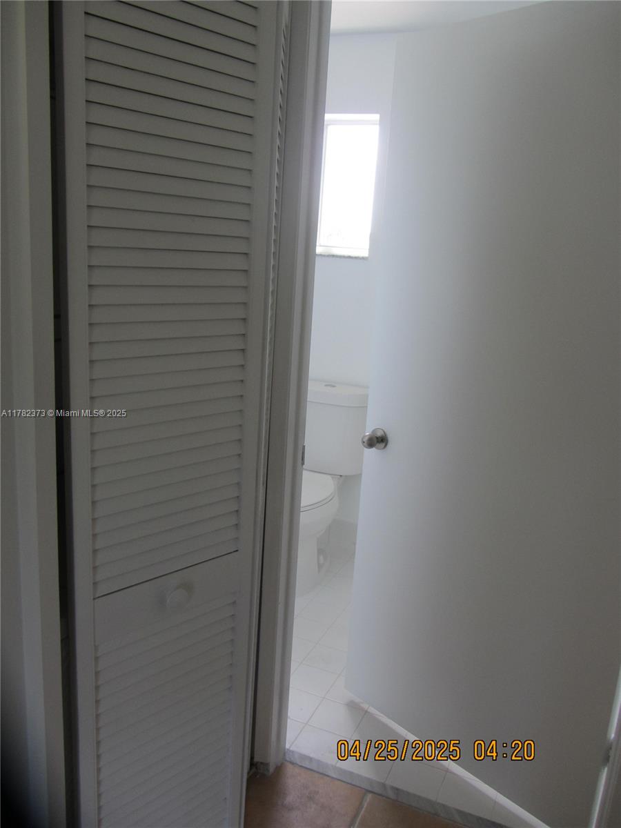 Villa Encantada Miami, FL 33177 - Photo 32 of 35 a view of small space with racks on the wall