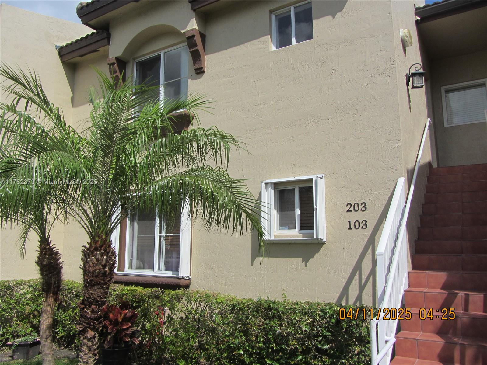 Villa Encantada Miami, FL 33177 - Photo 10 of 35 front view of a house with a yard