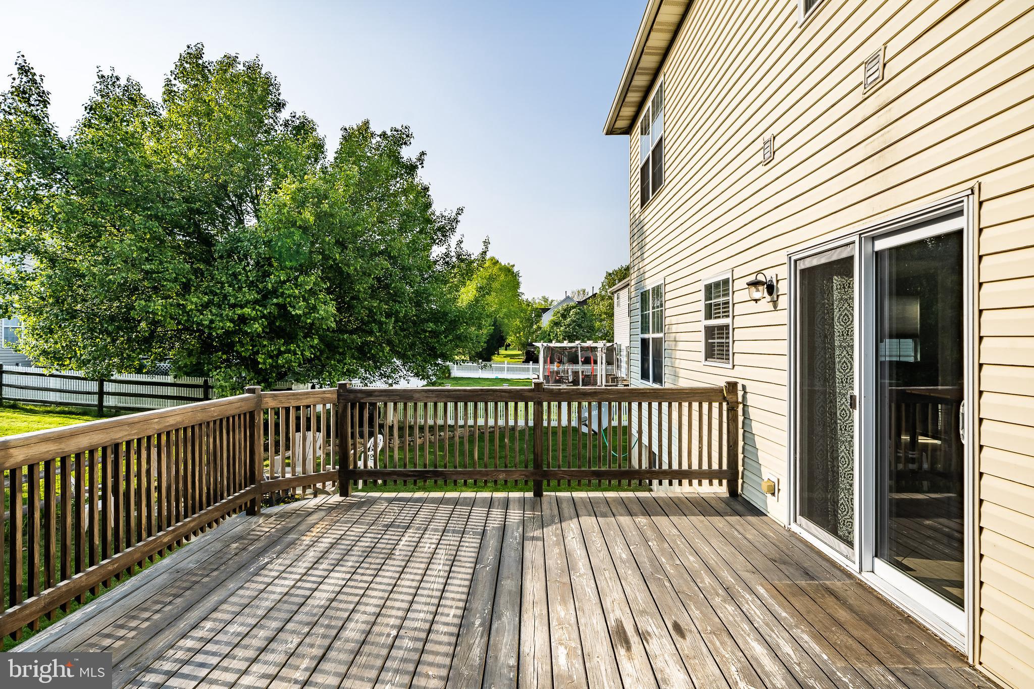 108 Hydrangea Way Coatesville, PA 19320 - Photo 40 of 47 Large rear deck w/sliding doors from kitchen