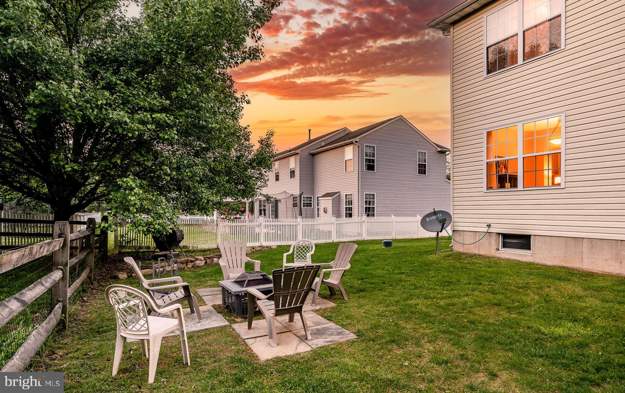 108 Hydrangea Way Coatesville, PA 19320 - Photo 47 of 47 Enjoy the beautiful sunsets by the fire!