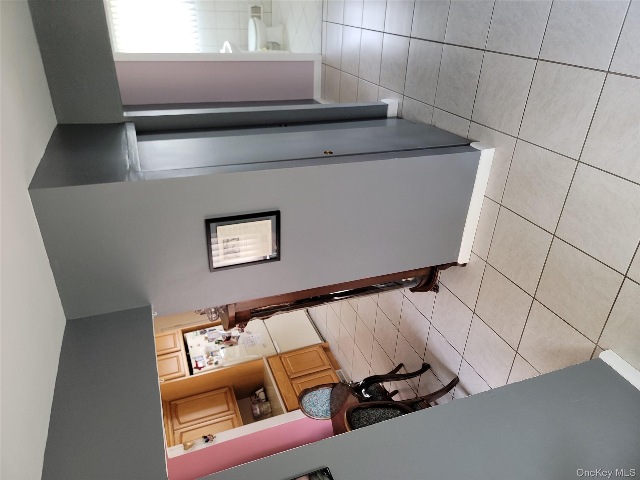 7 Deville Drive Selden, NY 11784 - Photo 11 of 19 a view of a livingroom with storage and utility