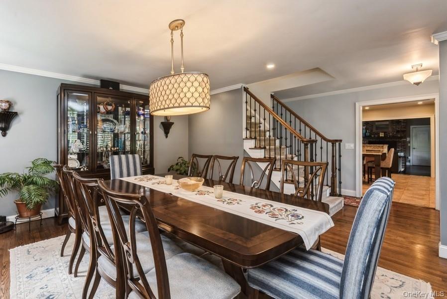 330 Private Road East Patchogue, NY 11772 - Photo 13 of 42 a view of a dining room with furniture window and wooden floor