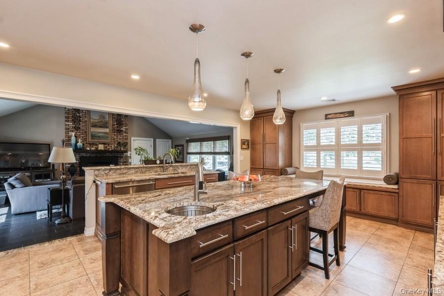 330 Private Road East Patchogue, NY 11772 - Photo 38 of 42 a kitchen with a stove and a refrigerator