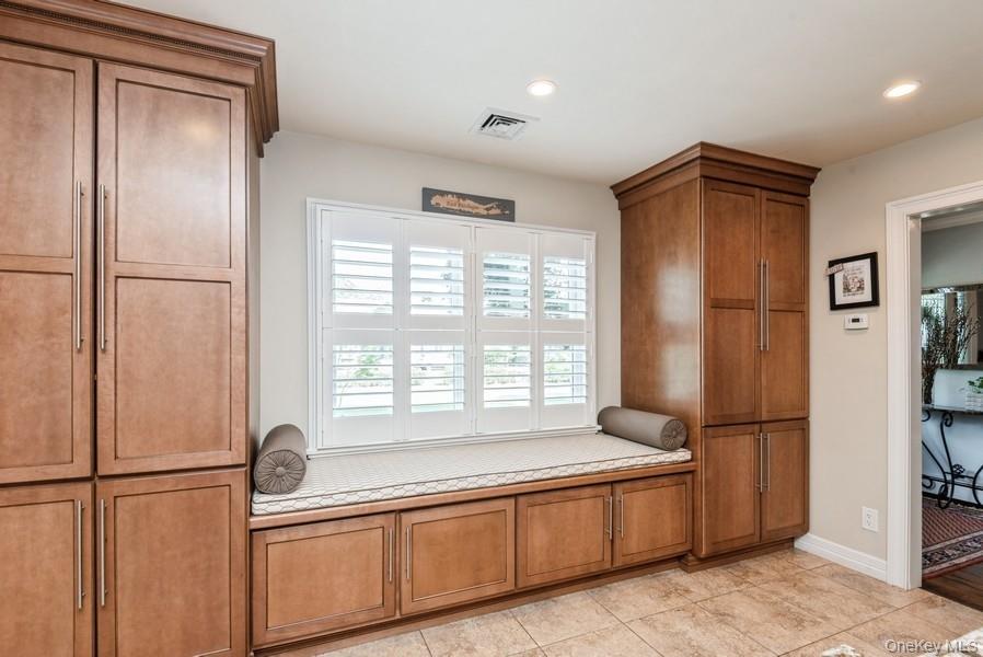 330 Private Road East Patchogue, NY 11772 - Photo 28 of 42 a kitchen with stainless steel appliances granite countertop a refrigerator and a sink