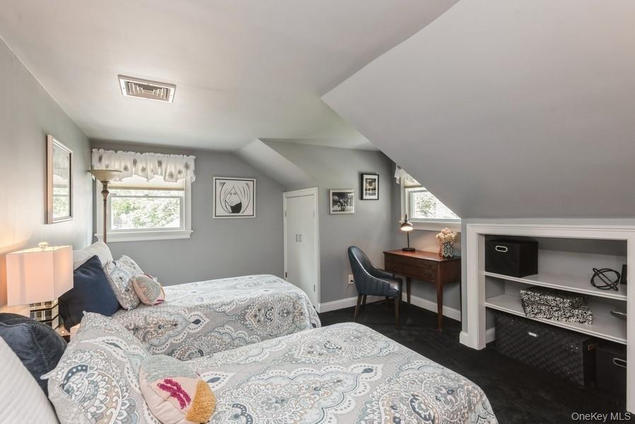 330 Private Road East Patchogue, NY 11772 - Photo 33 of 42 a bedroom with a bed and wooden floor