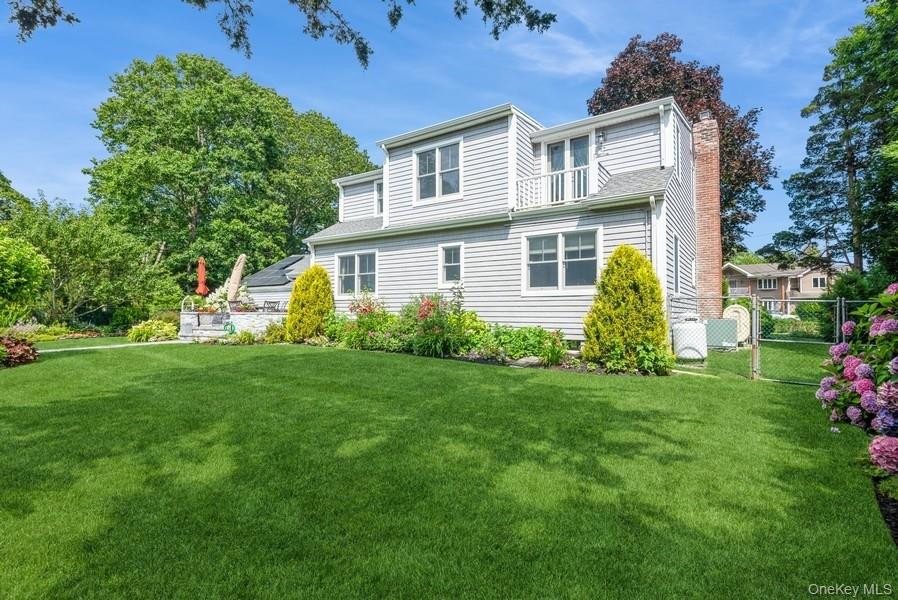 330 Private Road East Patchogue, NY 11772 - Photo 4 of 42 a front view of house with yard and green space