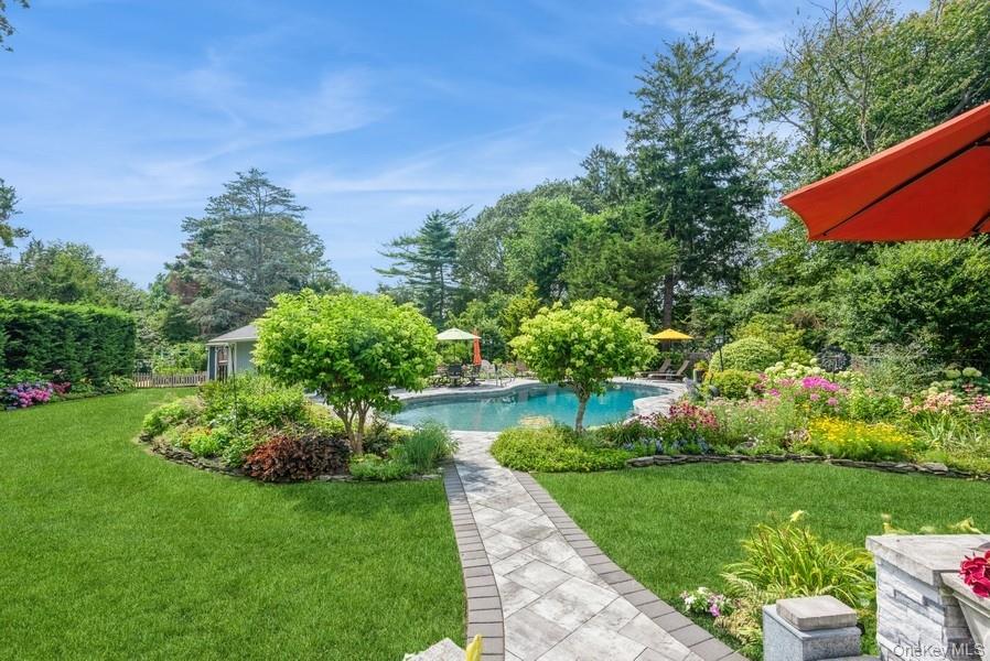 330 Private Road East Patchogue, NY 11772 - Photo 10 of 42 a view of a garden with a lake view
