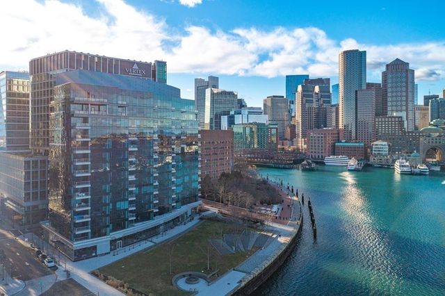 a view of a city with tall buildings